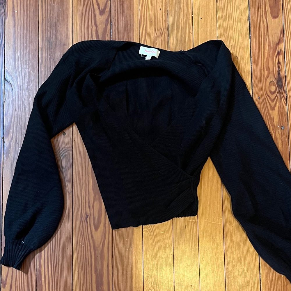 Women’s black cross front sweater